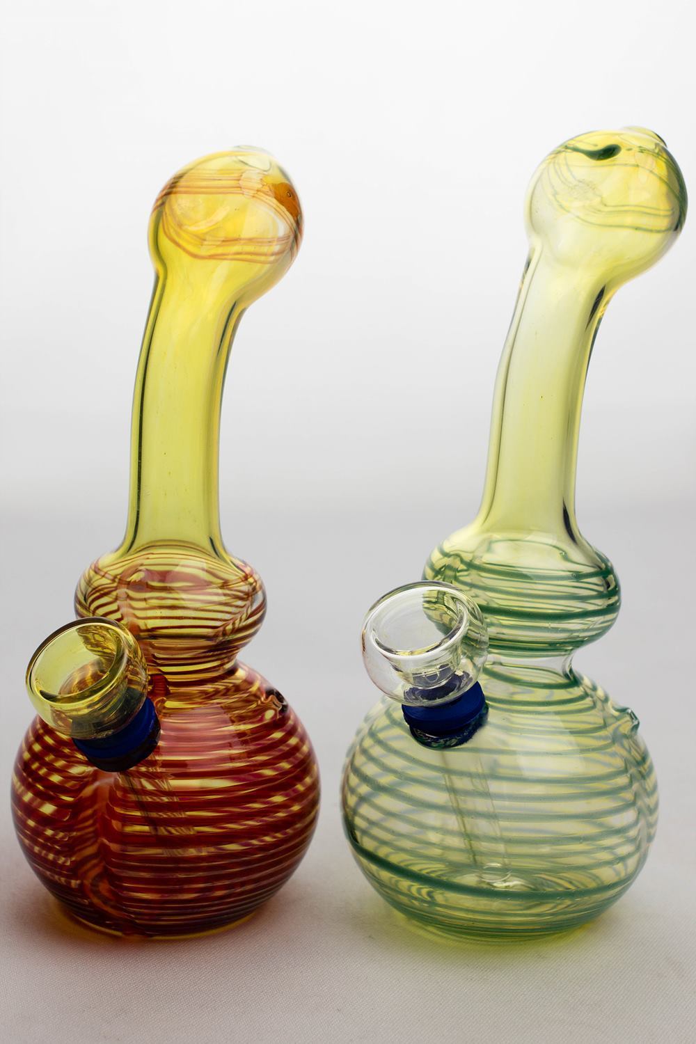 9d553229-fc78-4504-8f7e-5ecb97c481f8 6" changing color glass water bong