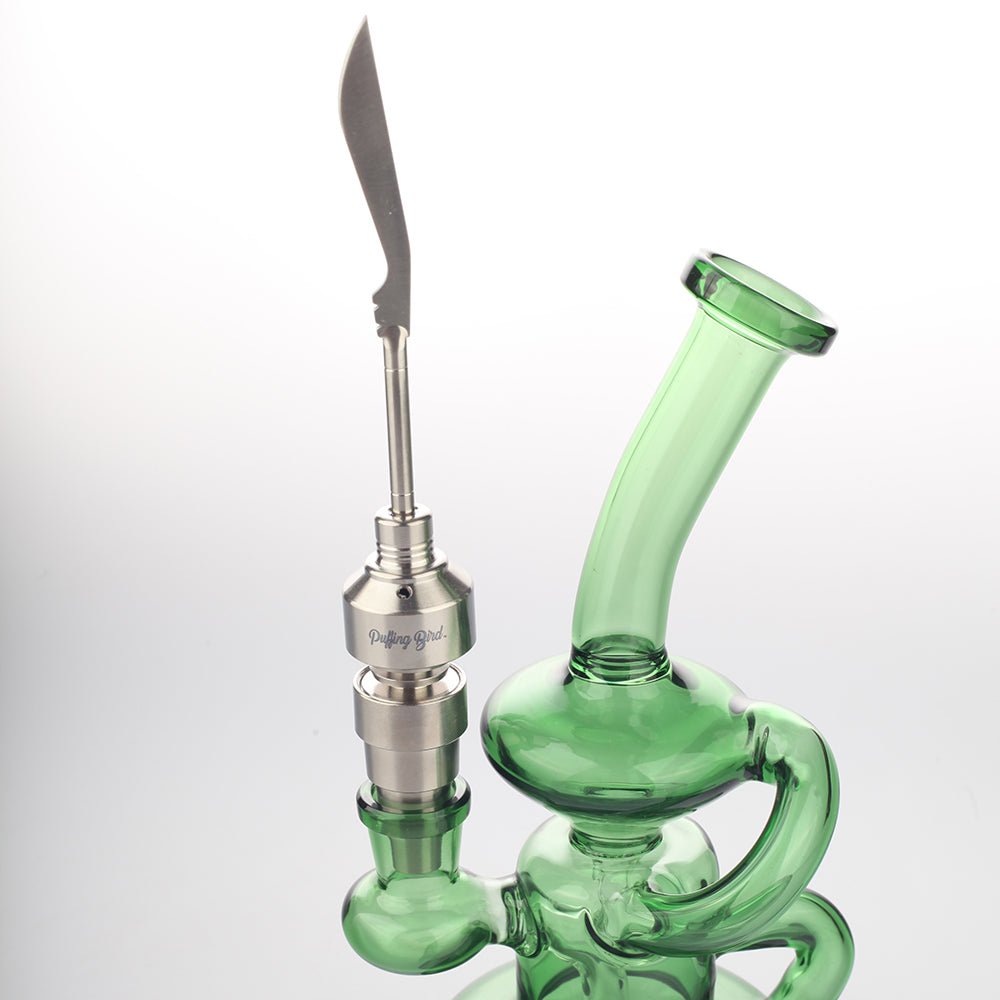 Titanium_Carb_Cap_W_Sword_Blade_Carver_On_Dab_Rig-497315.jpg Titanium Carb Cap W/ Sword Blade Carver